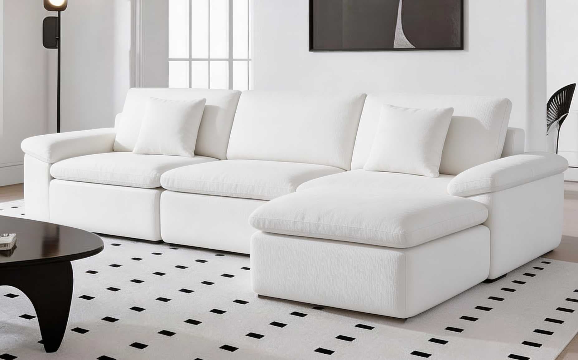 The Caterpillar modular sofa styled in a bright, airy living room
